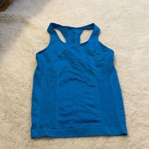 Blue work out tank. Sweat wicking material.